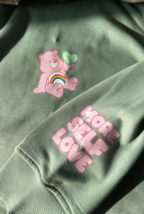 Cheer Bear More Self Love Hoodie - Sage