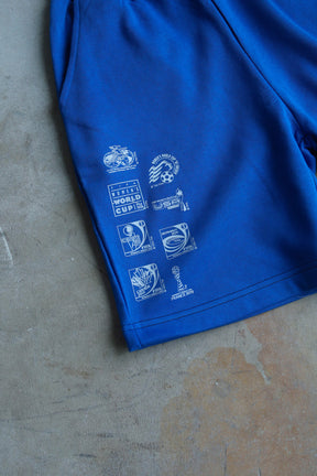 The World is at Her Feet Fleece Shorts - Royal